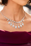 REIGNING ROMANCE - WHITE RHINESTONE SILVER NECKLACE - PAPARAZZI LIFE OF THE PARTY NOVEMBER 2022