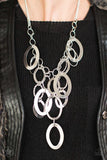 A Silver Spell Necklace Set